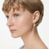 Idyllia-Ohrringe mit Ear Cuff, gemischte Schliffe, Herz mit Schlüssel, rosa, goldfarben plattiert Idyllia-Ohrringe mit Ear Cuff, gemischte Schliffe, Herz mit Schlüssel, rosa, goldfarben plattiert