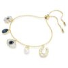 Symbolica-Armband mit Kristallperle, Kleeblatt, bösem Blick und Hufeisen, blau, vergoldet